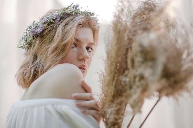 Portrait of a young woman looking down