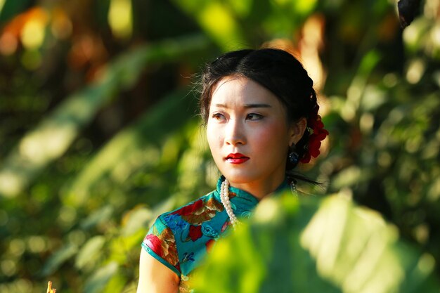 Portrait of young woman outdoors