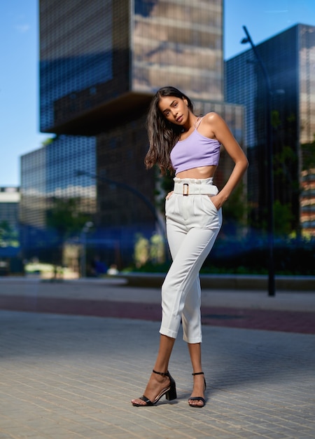 Portrait of young woman at outdoors.