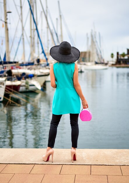 Portrait of young woman at outdoors.