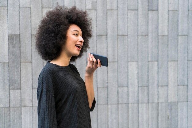 Portrait of young woman on the phone