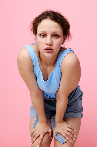 Portrait of a young woman posing fashion modern style cropped view unaltered