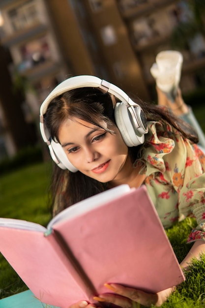portrait of young woman reading book