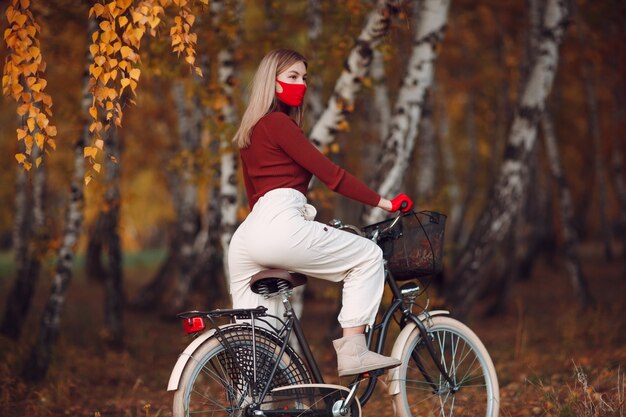 portrait young woman riding bicycle