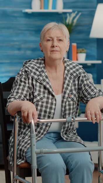 Portrait of young woman sitting on chair