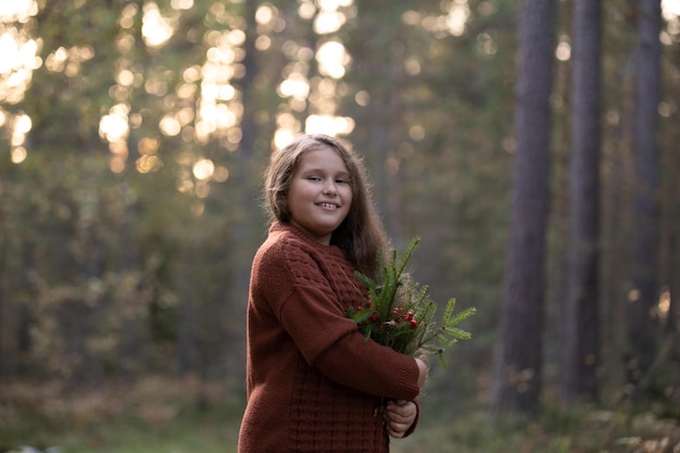 Photo portrait of young woman standing against trees