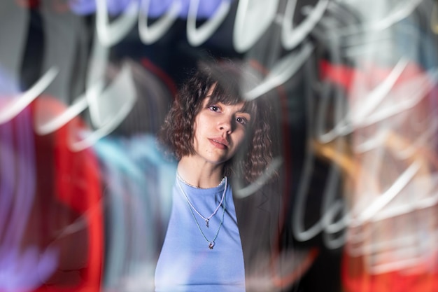 Portrait of young woman standing in gym