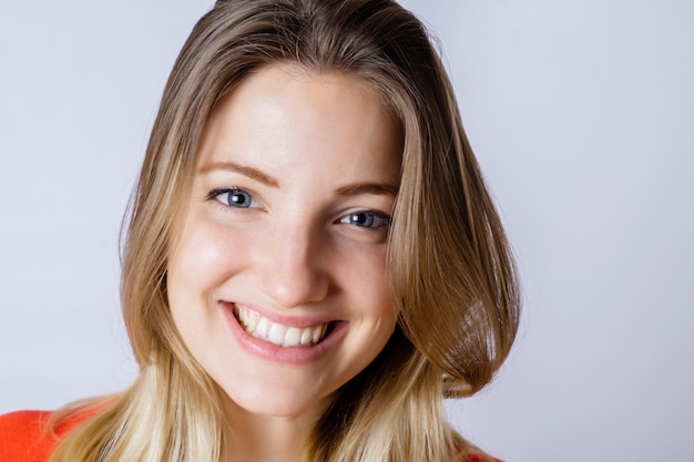 Portrait of young woman in a studio.