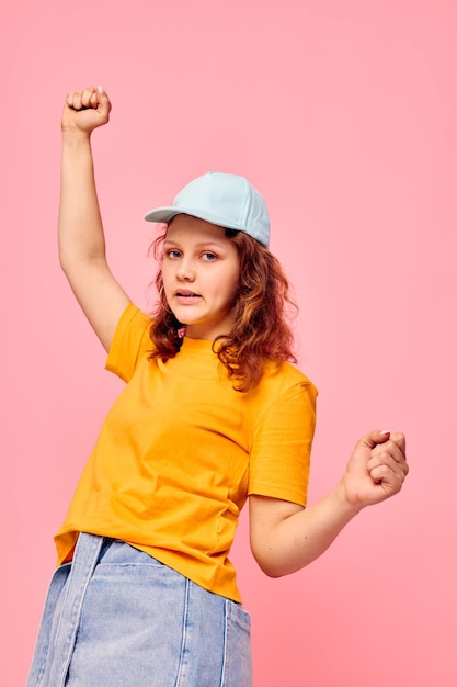 Portrait of a young woman in stylish youth clothes hand gesture fun lifestyle unaltered