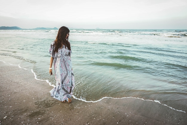 Portrait of young woman on the tropical beach