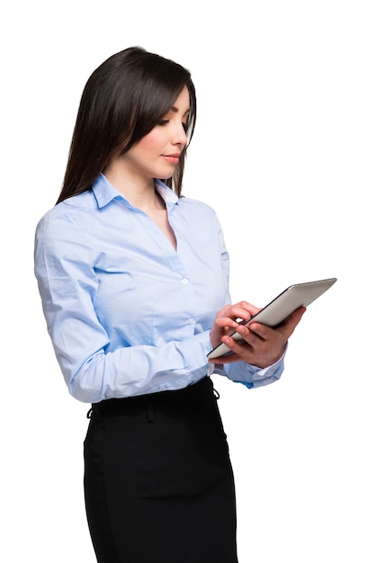 Portrait of a young woman using a digital tablet