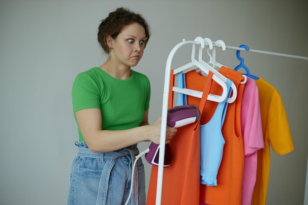 Portrait of a young woman wardrobe colorful clothes Youth style isolated backgrounds unaltered