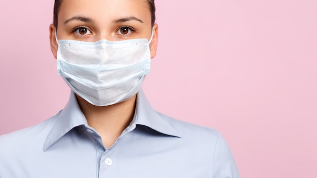 portrait of young woman wearing a face mask, coronavirus prevention