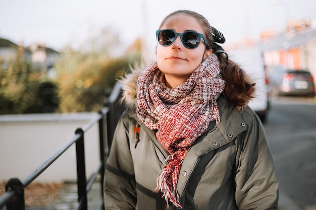 Portrait of young woman wearing sunglasses