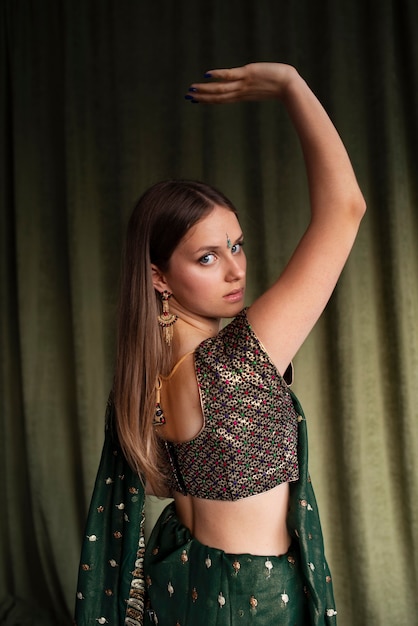 Portrait of young woman wearing traditional sari garment