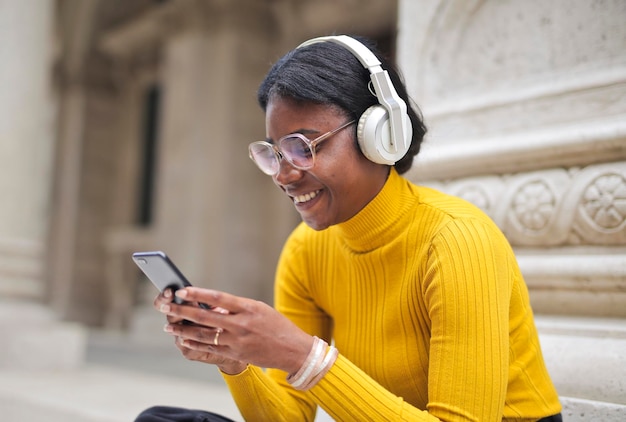 portrait of young woman while listening to music