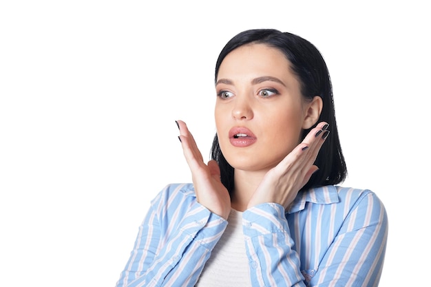 Portrait of young woman on white background