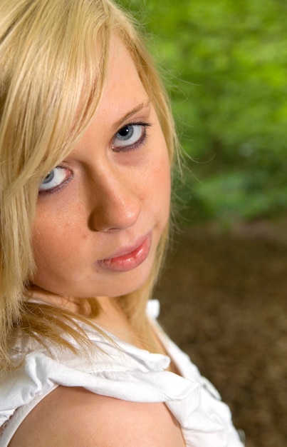 Portrait of young woman with blond hair