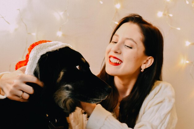 Photo portrait of young woman with dog