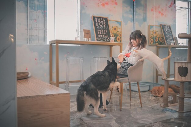 Photo portrait of young woman with dog