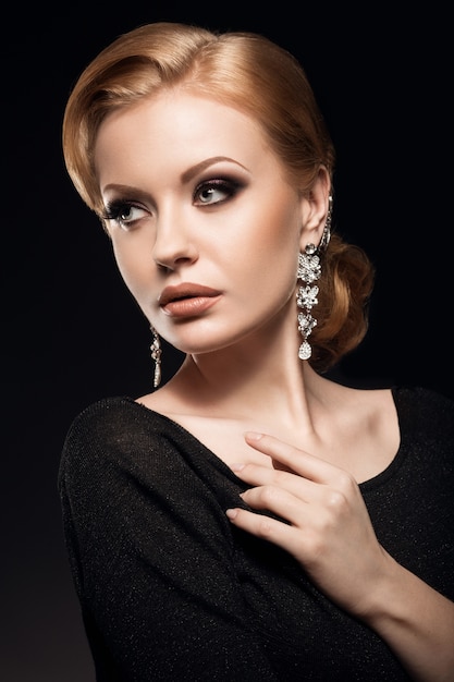 Portrait of a young woman with elegant hairstyle