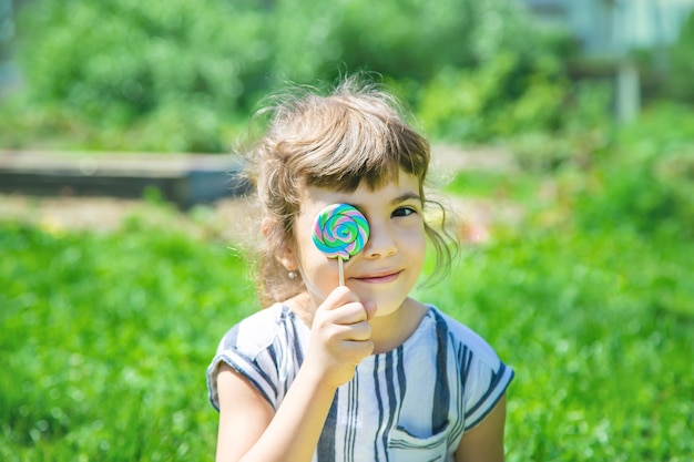 Portrait of young woman with eyes closed standing on field