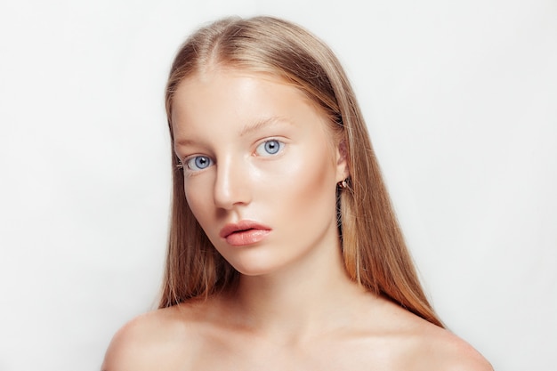 Portrait of young woman with natural makeup