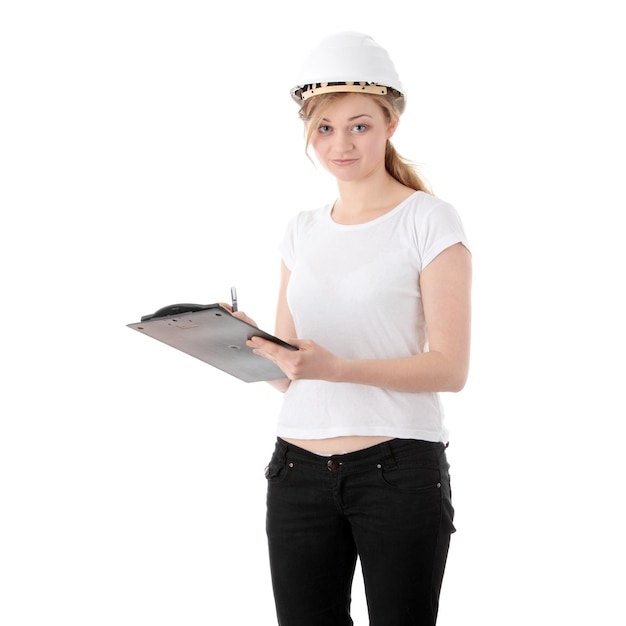 Photo portrait of young woman writing while standing against white background