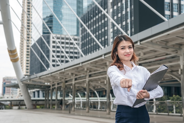 Portraits of beautiful asian woman look cheerful and confidence is standing