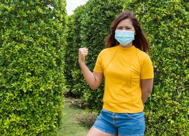 Portraits of women wearing protective masks