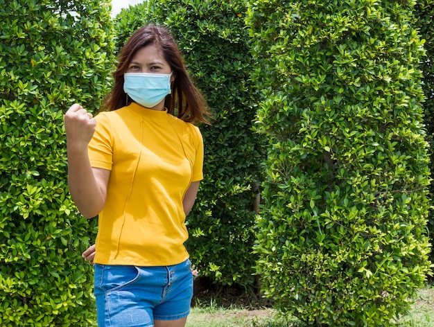 Portraits of women wearing protective masks