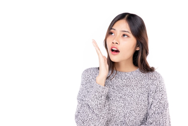 Portraits of young Asian women. Showing a shocked expression, a beautiful girl with a sense of self-confidence, good looking, happy isolated on a white background.