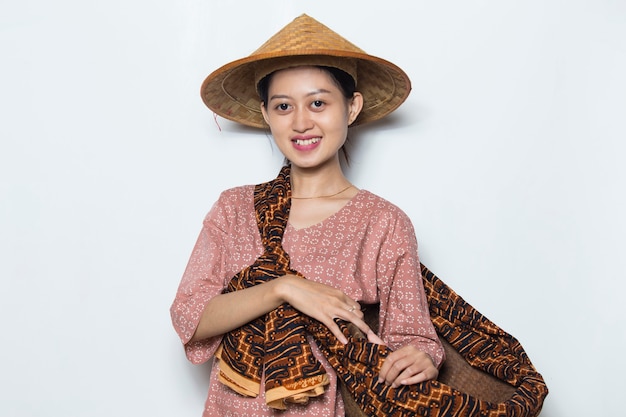 Portret jonge Aziatische vrouwelijke boer op witte achtergrond