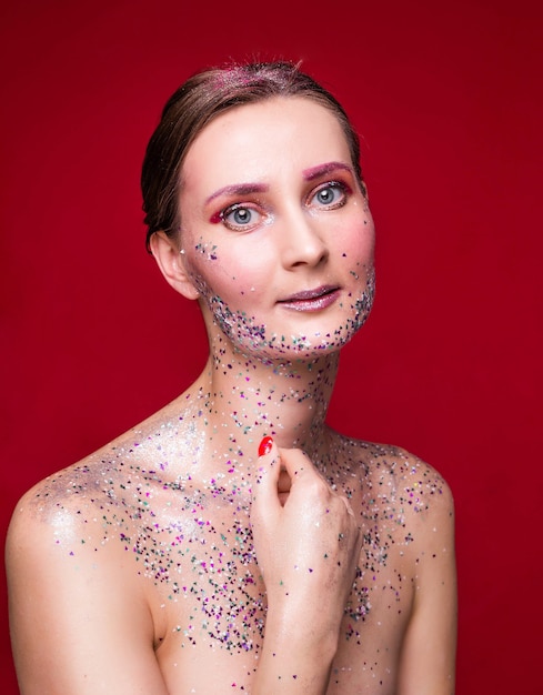 Portret mooie vrouw met glitter make-up