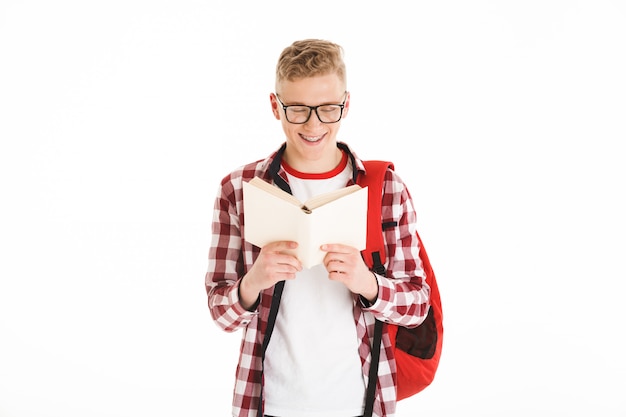 Foto portret van een gelukkig schooljongen in brillen