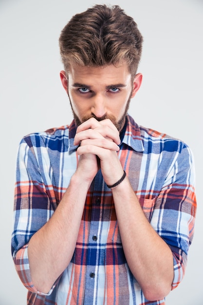 Portret van een jonge man die bidt