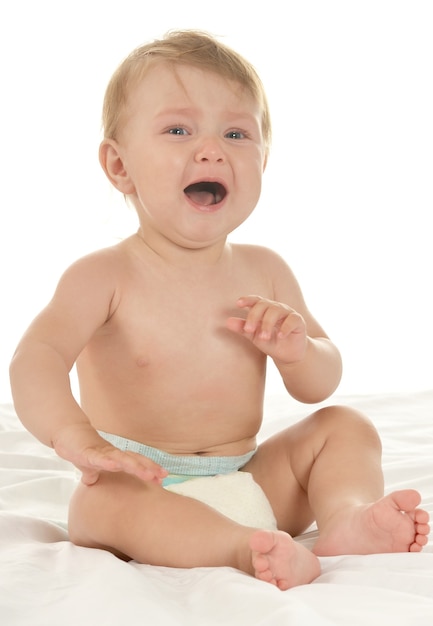 Portret van een mooie schattige baby op een witte achtergrond