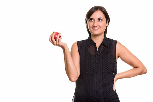 Portret van jonge mooie vrouw met rode appel