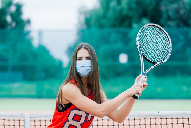 Portret van tennis speler meisje met racket