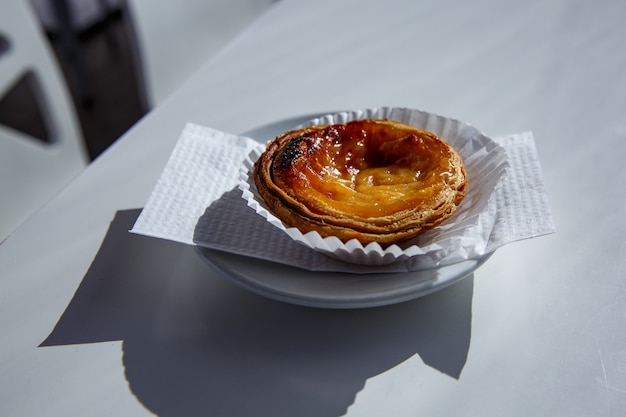 Portuguese dessert pastel de nata on a plate.