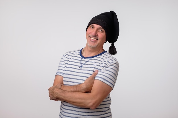 Portuguese fisherman standing on gray background