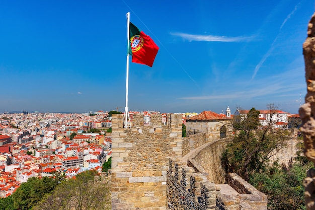 Portuguese flag on fortress wall, Lisbon, Portugal