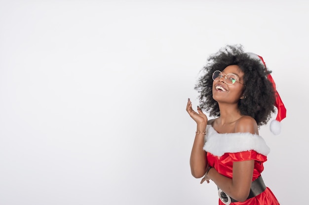 Posh african woman laughing with a christmas dress