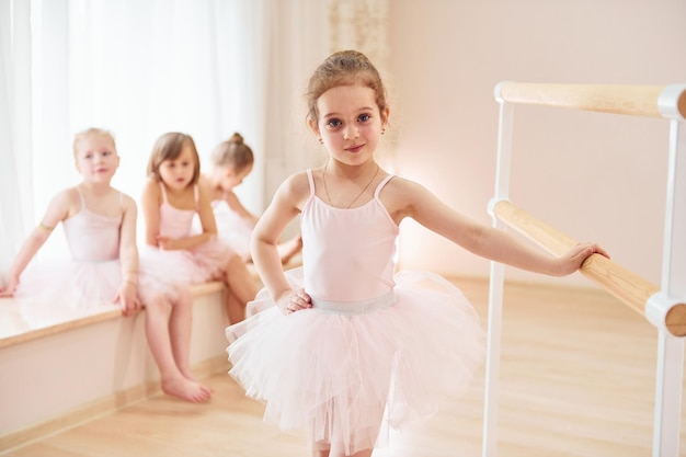 Posing for a camera Little ballerinas preparing for performance