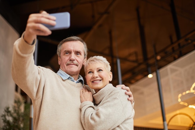 Posing with wife for selfie