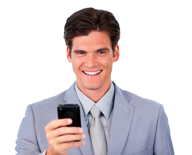 Positive businessman sending a message a newspaper