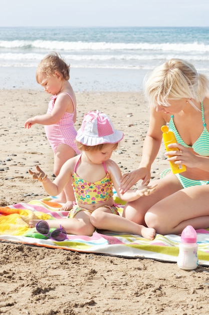 Positive caucasian family at the beach 