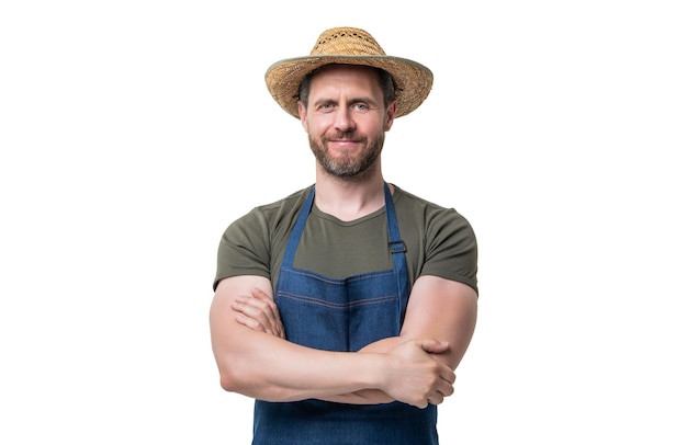 Positive caucasian man in hat and apron isolated on white background