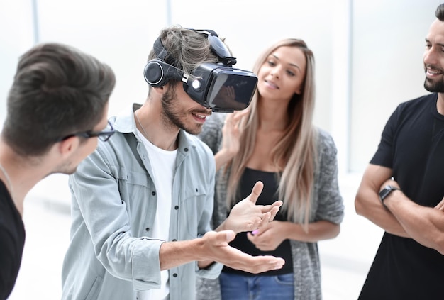 Positive colleagues testing virtual reality glasses