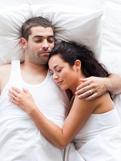 Positive couple sleeping 